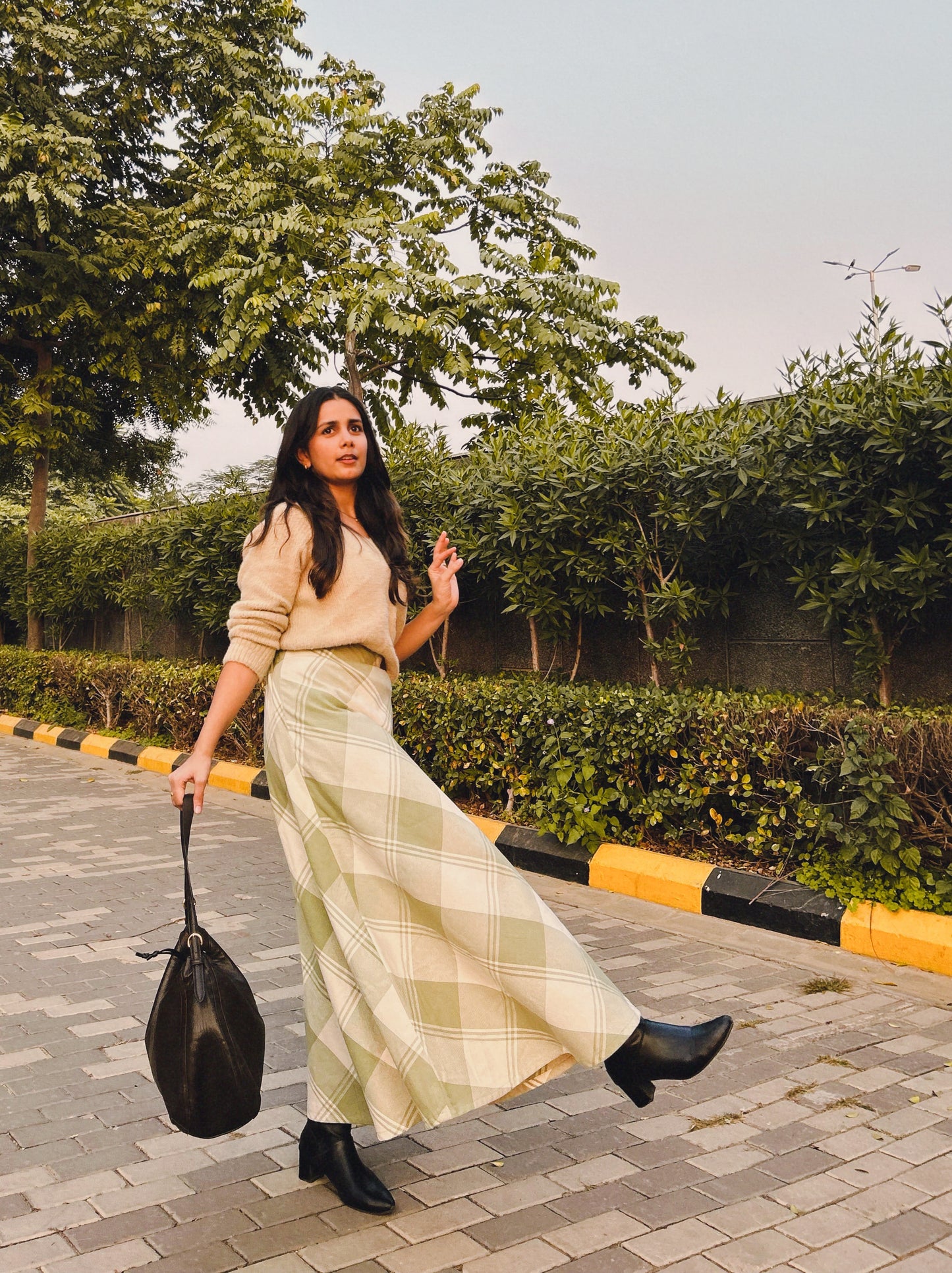 Green checkered skirt winter styling outfit