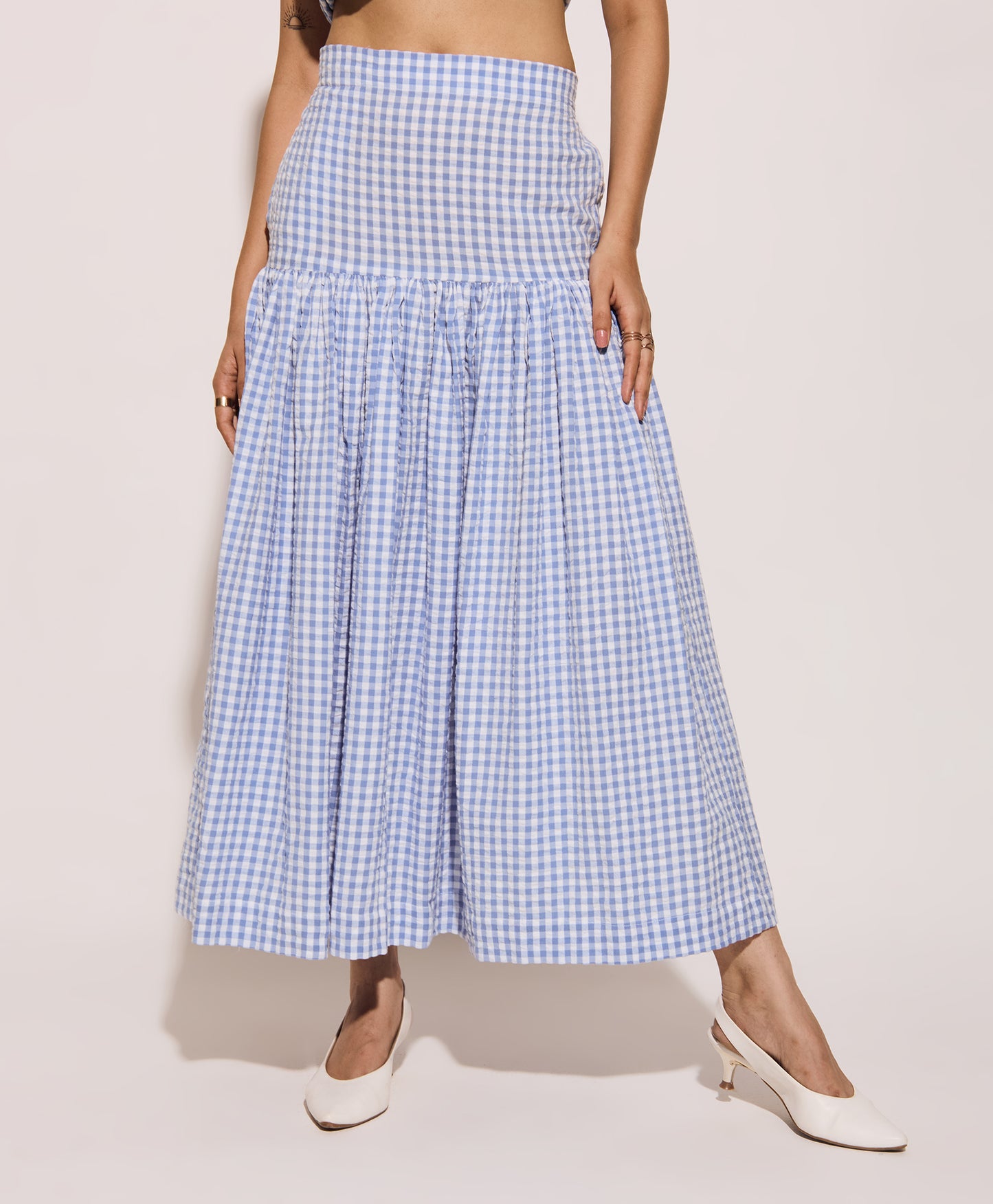 Breathable blue gingham skirt close-up fabric