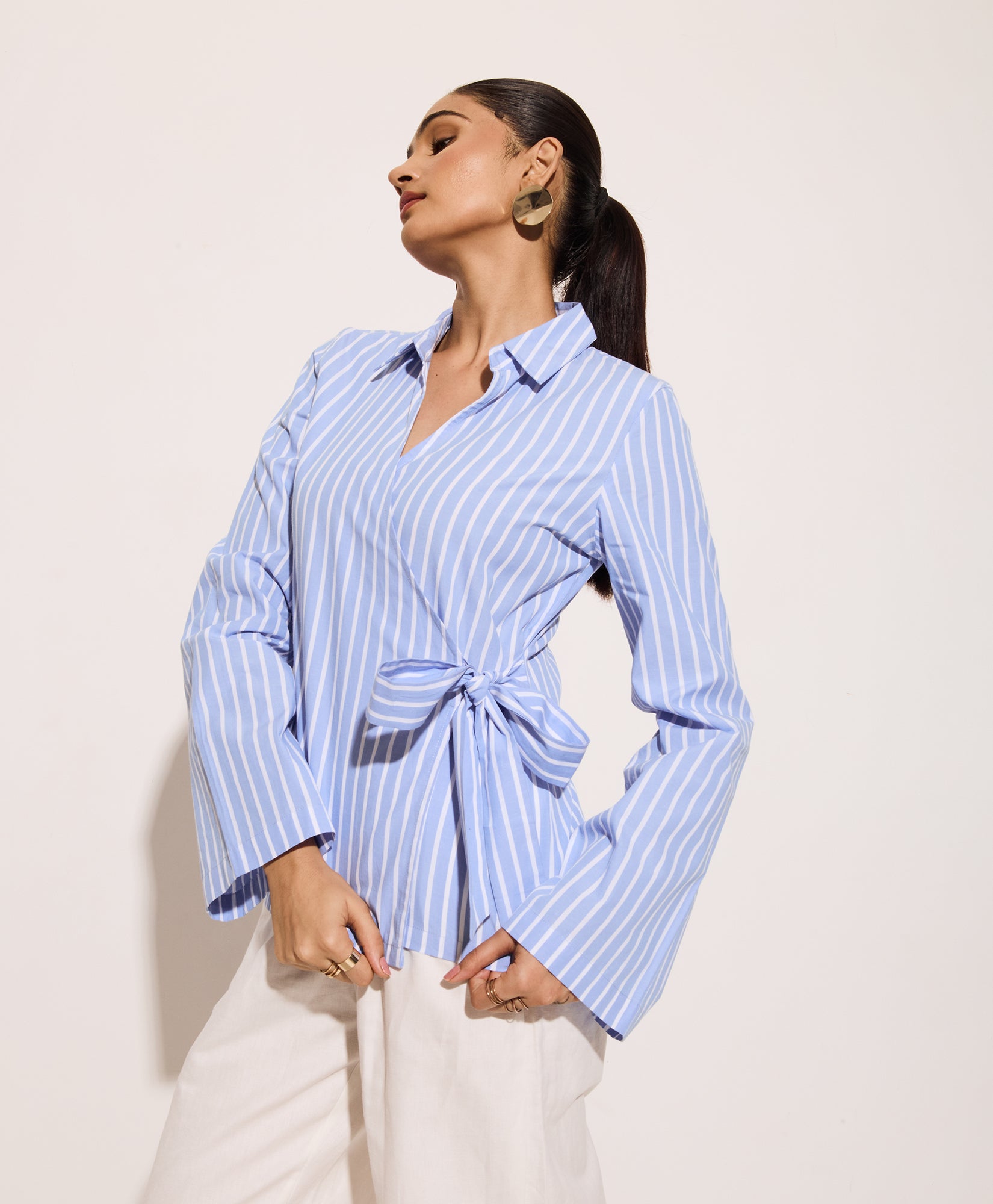 Powder blue wrap blouse for office wear