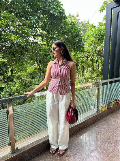 Vertical stripe halter shirt styled with trousers